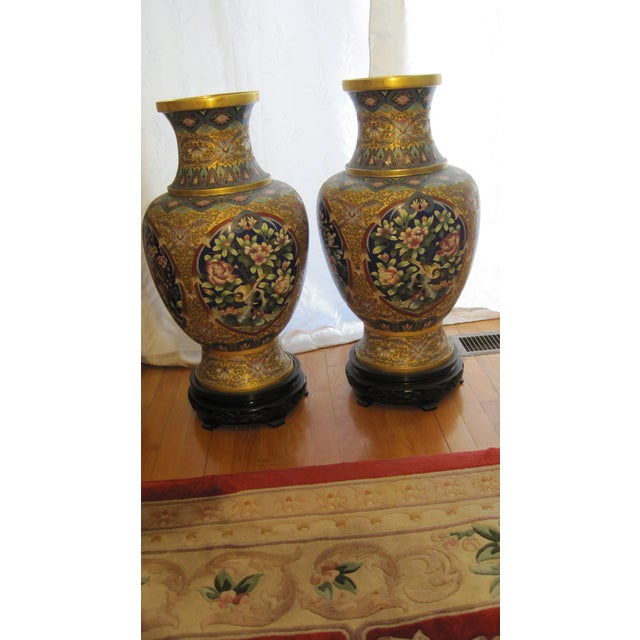 Pair of Chinese cloisonné enamel baluster vases • Height: 26 inches • Width: 8½ inches • Copper body • Cloisonné enamel...