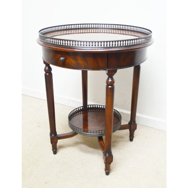 Side Table by Theodore Alexander, store item #512. It features galleries on the top and bottom, and one drawer.
