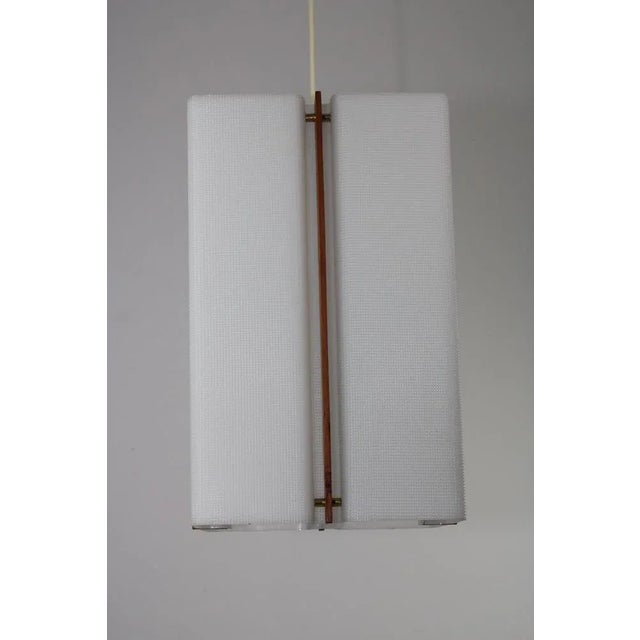 Acrylic Glass and Teak Ceiling Light attributed to Rupert Nikoll, 1950s, in Very Good conditions. Designed 1950 to 1959...