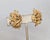 Circa 1972-4 goldtone coral with bumps textured clip and adjustable screw back earrings. Marked "NAPIER©" on the clips....