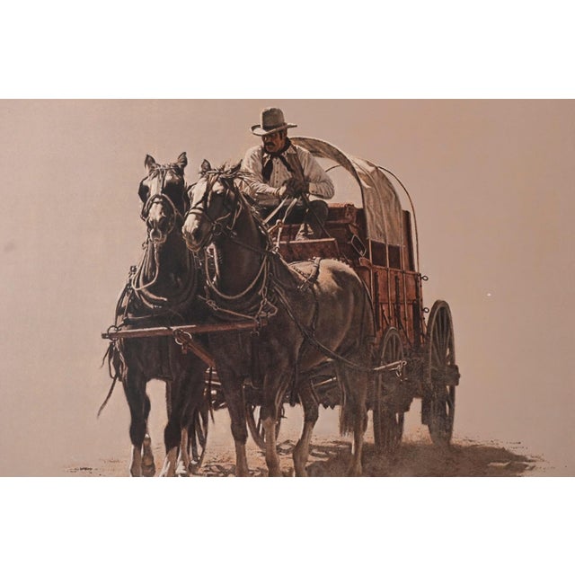 A pencil signed and numbered limited edition print of James Bama's Chuck Wagon, published by The Greenwich Workshop in...