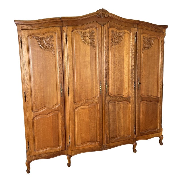 Vintage Louis XVI French Oak Four Door Carved Wardrobe For Sale