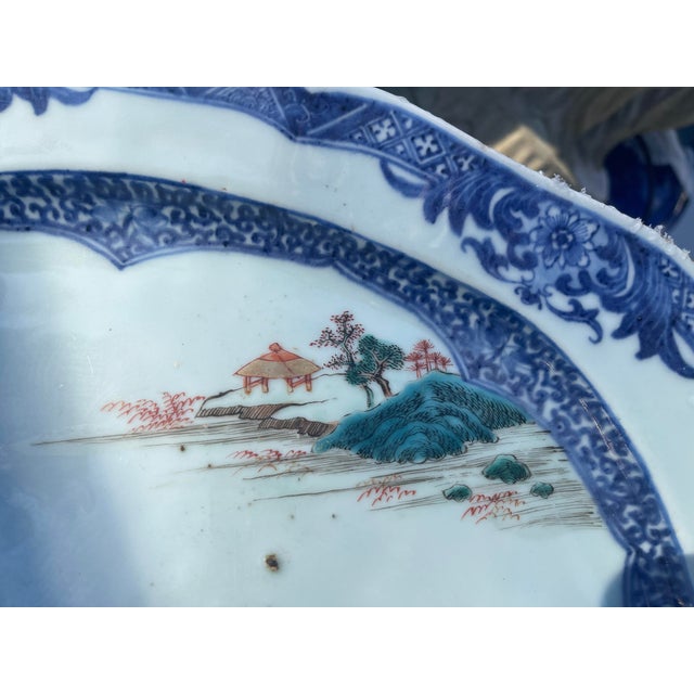 This is a Chinese Export Famille Rose porcelain charger /platter, from the Qianlong period (1735-1796). The center...