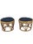 A charming pair of vintage rattan and bamboo-style footstools featuring sculptural openwork frames, warm honey-colored...