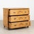 Antique pine chest of three drawers resting on bun feet. Note the applied decorative carving along paneled drawer fronts...