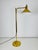 A brass floor lamp made in Germany in the 1970s. It is fascinating with its adjustable bar. The light is made of full...
