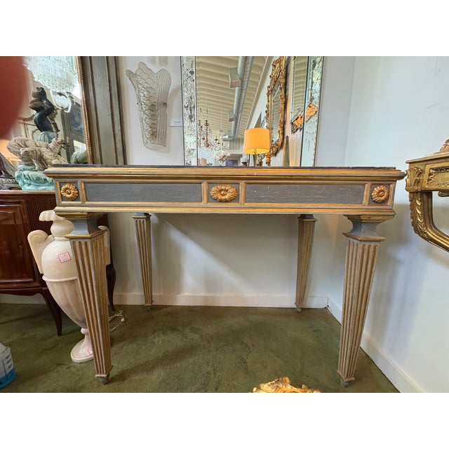 18th Century Neapolitan Console Table. Offered is an outstanding Italian Louis XVI painted and giltwood console table with...