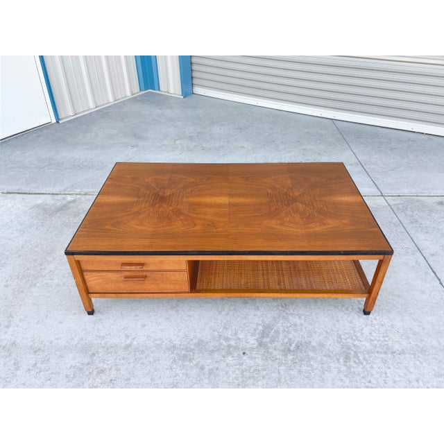 Combining exceptional functionality with iconic 1960s craftsmanship, this mid-century modern coffee table is crafted in...