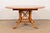 An exceptional English Country or Rustic European style pedestal extension dining table By Guy Chaddock & Co. USA, Late...