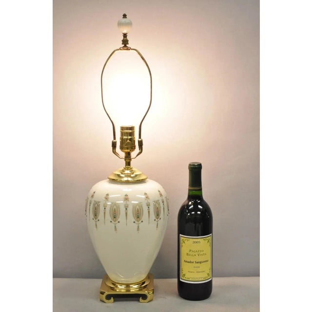 Lenox USA Vintage Porcelain and Brass Cream Jardinierie Decorated Table Lamp. Circa Late 20th Century. Measurements: 24" H...