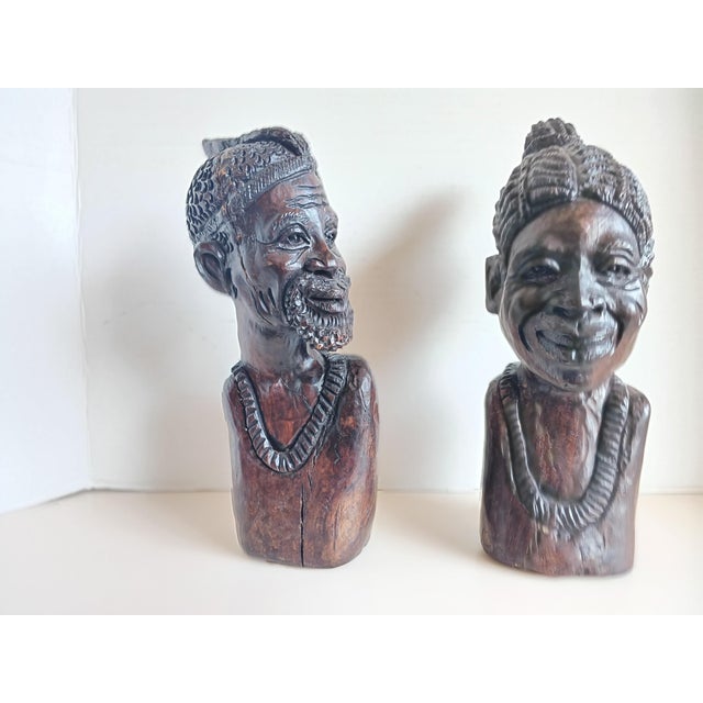 Exquisite pair of iron wood carved Shona male and female bust. It is unusual to find an actual pair, not one male and one...
