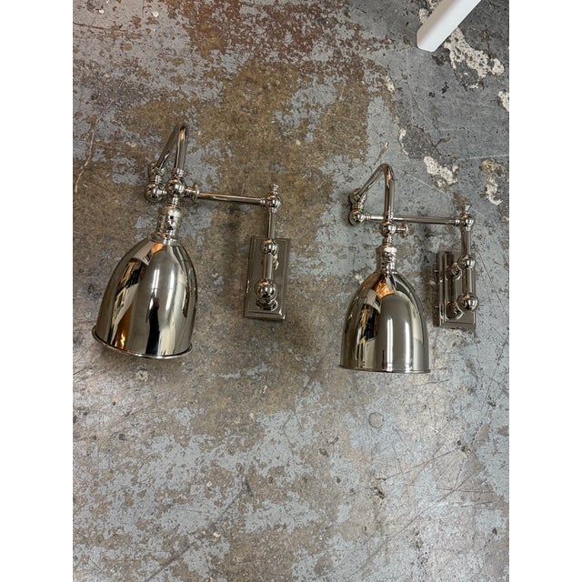 Design Plus Gallery presents a Pair of Pimlico Double Swing Arm Wall Lamps by Chapman & Myers for Visual Comfort. Each...