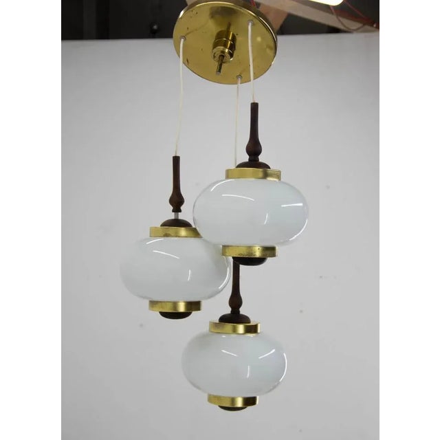3-flamming chandelier made in poland, very good original condition 3x75w, e25-e27 bulb us wiring compatible. This piece is...