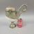 A wonderful Anglo-Indian hand hammered silver and nautilus shell bird container. Inspired by British Colonial objects,...
