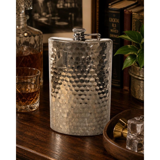 Vintage Japanese hammered stainless steel 16 oz flask with a sleek Mid-Century Modern profile and beautifully textured...