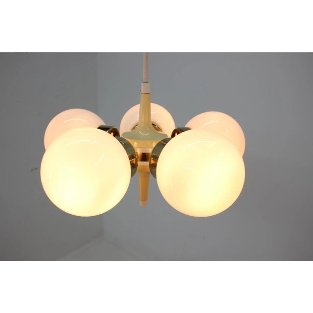 Good original condition. Measures: 5 x 60 w, e27. This piece is attributed to the mentioned designer/maker. It has no...