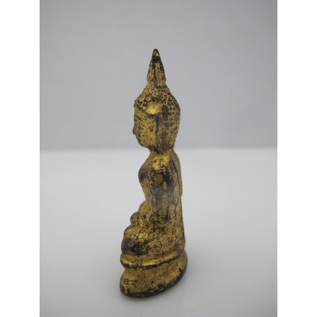 Thai Rattanakosin bronze Buddha figurine. Buddha figure seated in meditational pose with one hand to the earth. Nice...