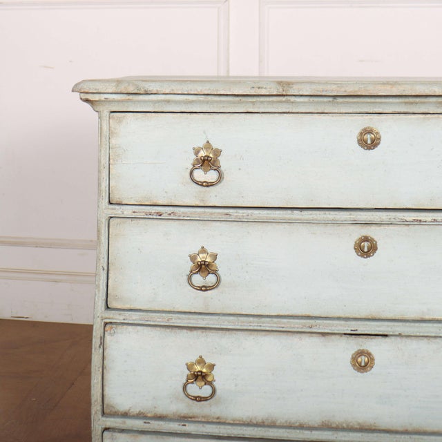 Early 19th century Dutch four drawer oak commode. 1820. This piece is designed in the style of the selected designer...