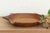 The sculptural form of this vintage bowl takes center stage. Carved from a single piece of solid hardwood, it features a...