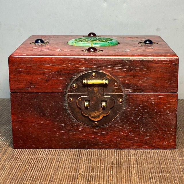 This exquisite vintage wooden box is a beautiful example of traditional Chinese-inspired craftsmanship. Crafted from...