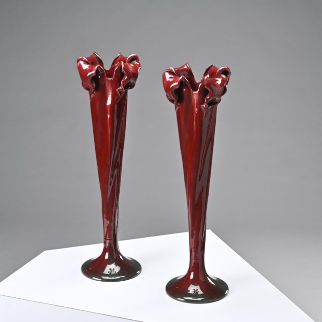 Pair of large glazed ceramic vases made by Delphin Massier at the end of the 19th century. Slender in form, they rest on...
