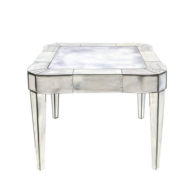 This stunningly beautiful mid-century smoked mirrored table with slightly bowed and curved corners was realized in...