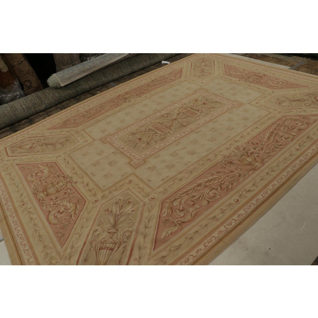 Handwoven in wool, this 8x12 Aubusson flatweave rug from China is quite architectural among those of its kind that...