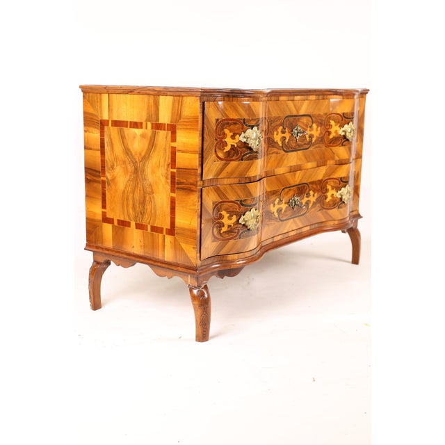 Rare 18th-century inlaid walnut commode, beautifully inlaid, with two triple-paneled drawers, box locks, and two keys. The...