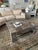 Gorgeous, square, grayish/taupe scale vintage marble coffee table. Grayish brown coloring with shades of cream, white, and...