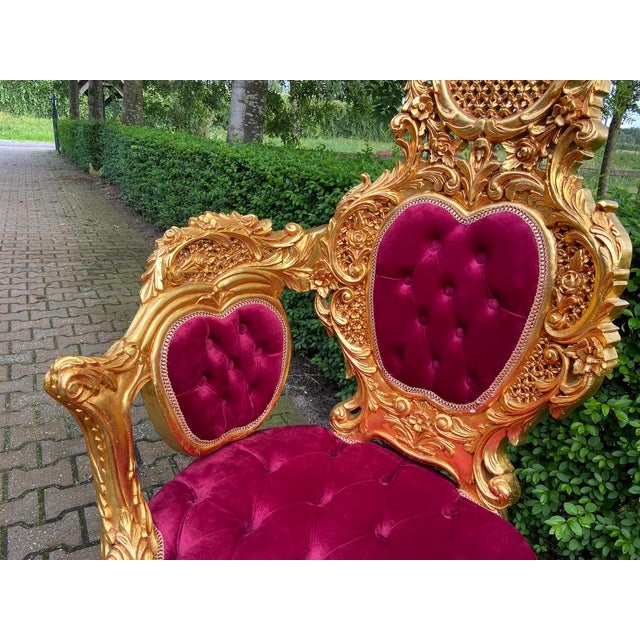 Bring dramatic elegance into your interior with this striking pair of 1970s Italian Baroque revival chairs. Rich in detail...