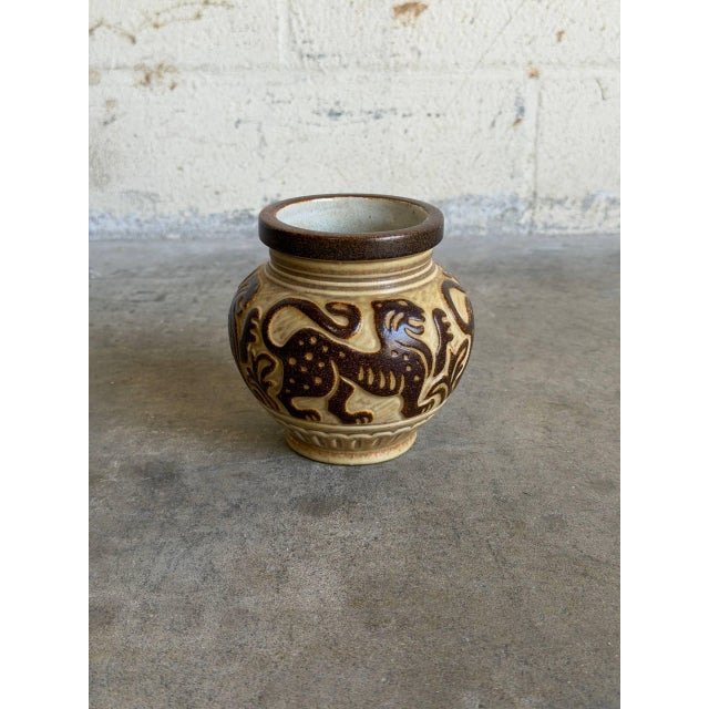 Vintage 1960s Danish Mid-Century Modern ceramic vase showcases a striking relief pattern from the historic Michael...