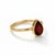 Pear Garnet Solitaire Ring in Gold Rich and captivating, this ring features a deep red pear-shaped garnet set in a smooth...