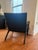 Authentic Hans J. Wegner CH25 lounge chairs manufactured by Carl Hansen & Søn in black oak with black woven paper cord....