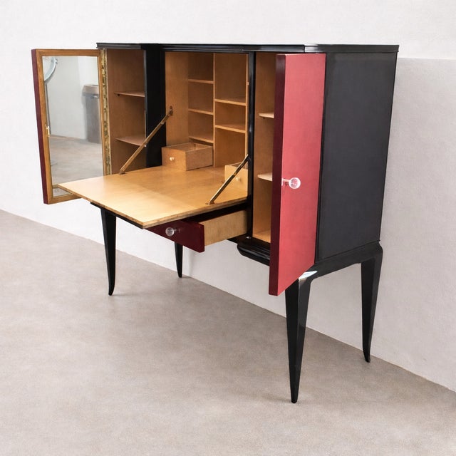 This striking Art Deco secretaire–vanity cabinet from the 1930s represents the refined, multifunctional furniture design...