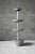 Remnant Etagere Sculpture by Studio DO Dimensions: Ø 18 x H 53 cm Materials: Aluminium Color: Shades of grey 6,5 kg