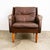 Outstanding top grain brown leather wingback lounge chair on 4 solid wood legs. This piece comes in a rich and high...