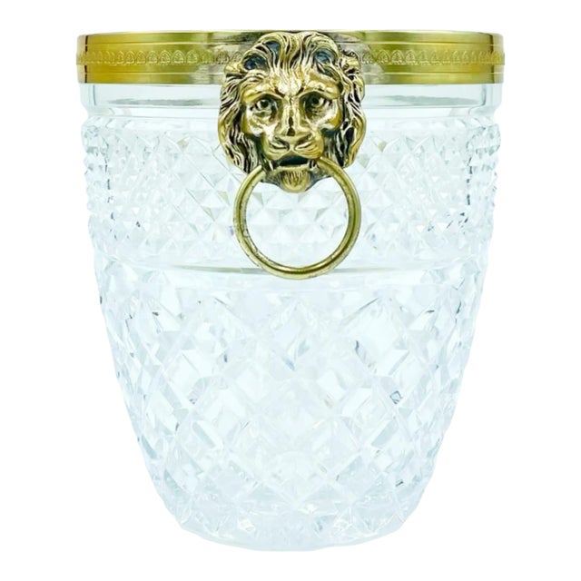 Details: -Vintage Saint Louis attributed lion head ice bucket -Exquisite hand-cut crystal ice bucket with gilded rim and...