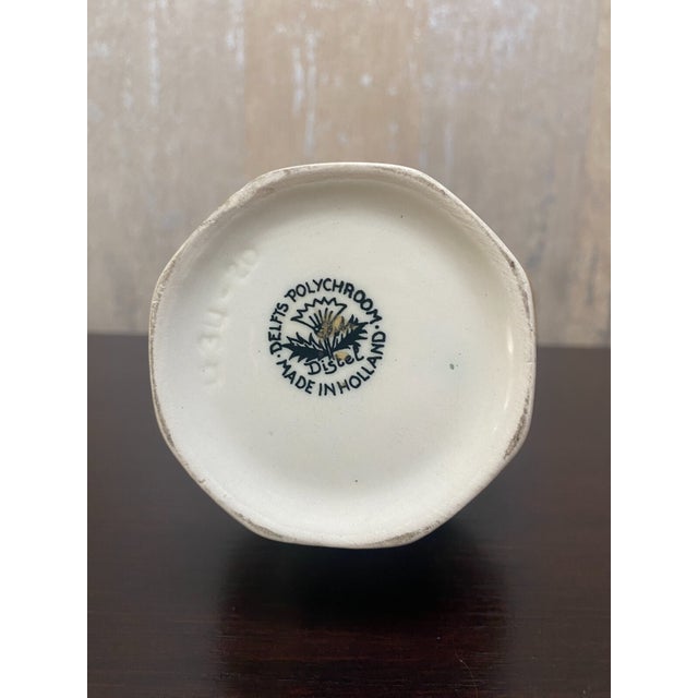 Beautiful vintage Delft polychrome pottery vase featuring an elegant hand-painted floral design and timeless European...