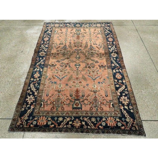 Early-20th century, antique Persian Sarouk carpet. Hand-Woven, Professionally washed.