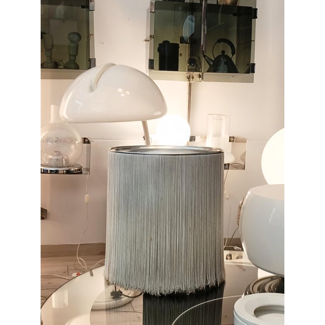 An extraordinary and rare table lamp designed by the renowned architect and designer Gianfranco Frattini and produced by...