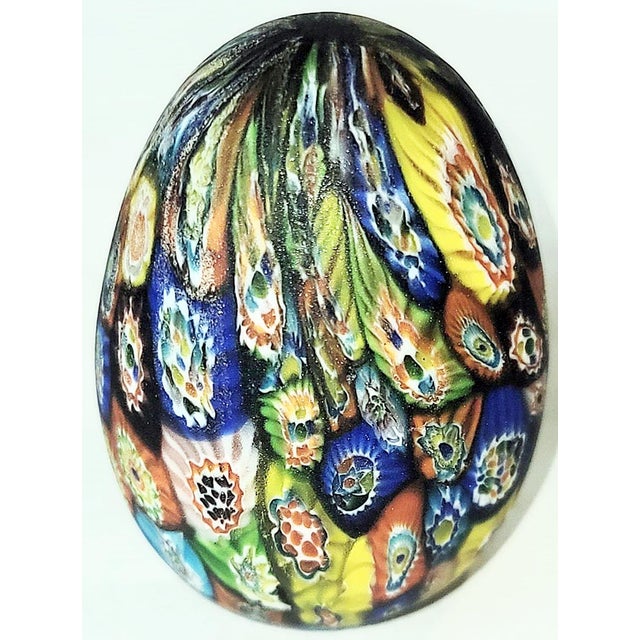 A tiny stunner, pulled glass Mille fiore egg paperweight, 1960s from Murano Italy.