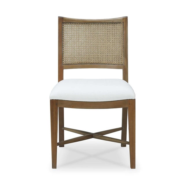This chair features a wooden frame finished in a warm straw wash, providing both durability and a timeless appeal. The...