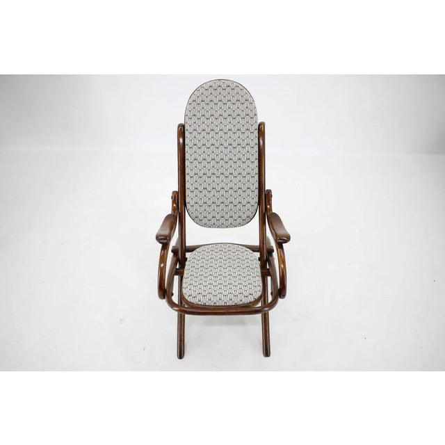 Manufactured in Austria. Newly reupholstered and finished with shellac.