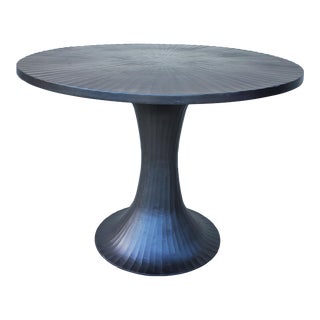 CB2 Cast Aluminum Ribbed Round Dining Table in Charcoal For Sale