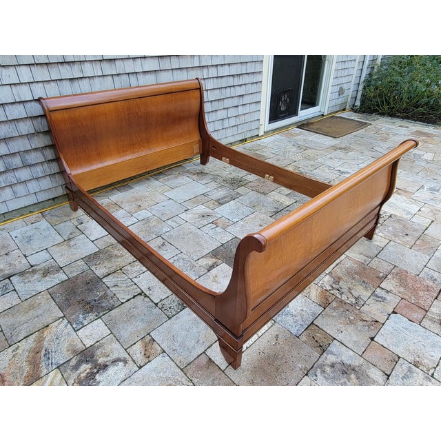 Vintage French Solid Cherry Wood Louis Philippe sleigh bed frame by the renowned French manufacturer, Grange Furniture...