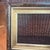 Antique burl wood and gold-gilt picture frame with a multi-layered, stepped molding profile and subtle corner or edge...