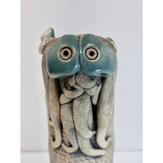 This intriguing piece is a signed Richard Marshall studio pottery Woo creature. Woo Creatures, according to lore, are...
