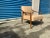 Mid century style lounge chair in tan leather. The chair is done in a an leather newly upholstered and refinished. The...