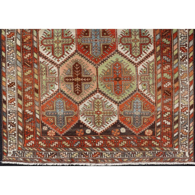 Tribal Antique Persian Tribal Motif Design With Crosses Bakhtiari Rug in Multi Colors 4'7 X 6'5 For Sale - Image 3 of 12