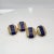 A fine pair of antique Art Deco cufflinks. By Boucheron. In 18k gold. Each with octagonal, faceted gold heads with lapis...